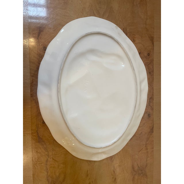 A magnificent vintage ceramic Thanksgiving turkey serving platter featuring exquisite high-relief detailing. The...