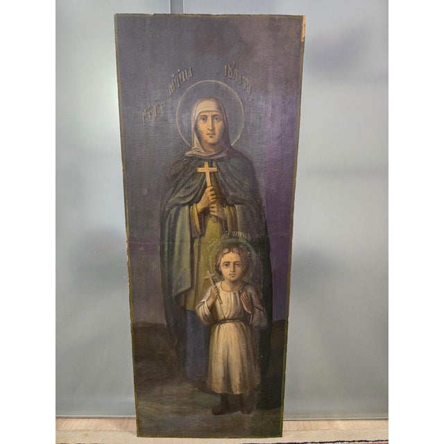 Presenting a magnificent 19th-century Orthodox icon depicting The Martyr Iolita and Kirill. This piece is painted in...