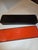 Great looking paper mache storage box with red interior.