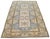Hand-knotted with care using traditional rug-making techniques, this wool rug blends timeless craftsmanship with a modern...