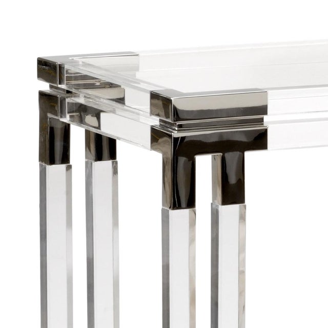 Modern acrylic console with tempered glass top and polished nickel accents. 32h x 54w x 16d