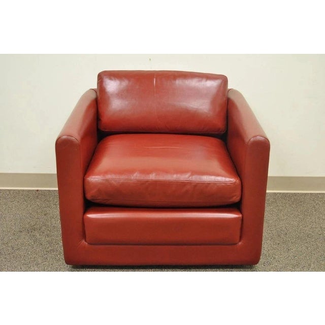 Vintage Mid Century Modern Red Leather Cube Club Lounge Chair on Rolling Casters. Item features clean lines, comfortable...