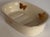 Presenting a darling porcelain soap dish decorated in gold gilt butterflies and red dot accents. The porcelain itself is...
