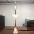 Add a touch of mid-century modern sophistication to your home with this Alabaster and Wood Table or Desk Lamp. This...