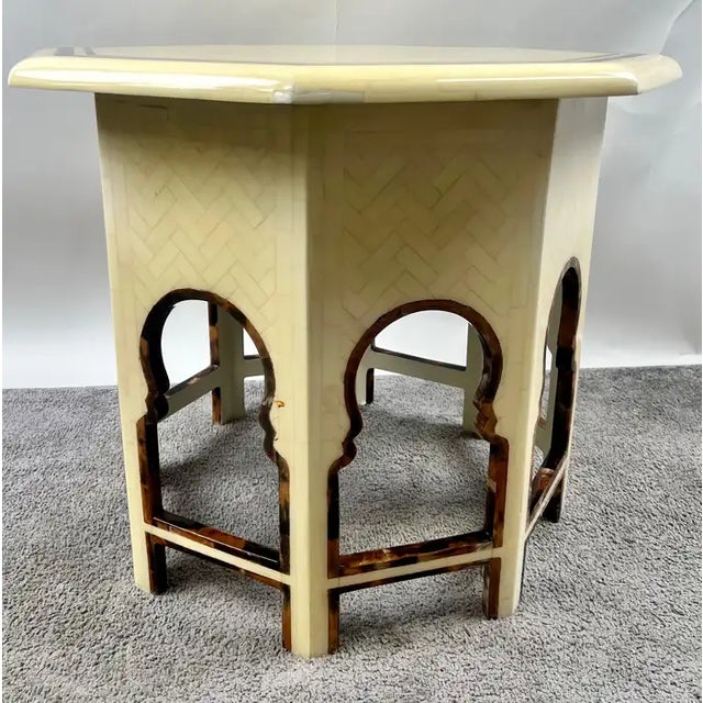 This exotic octagonal side table showcases exquisite bone inlay craftsmanship, inspired by traditional Moroccan and...