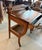 Antique solid walnut writing desk or occasional table on casters in the Eastlake style with a single drawer and two...
