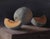 Melons by Kelly Birkenruth | Oil on Panel Still Life of Melons on a Table For Sale