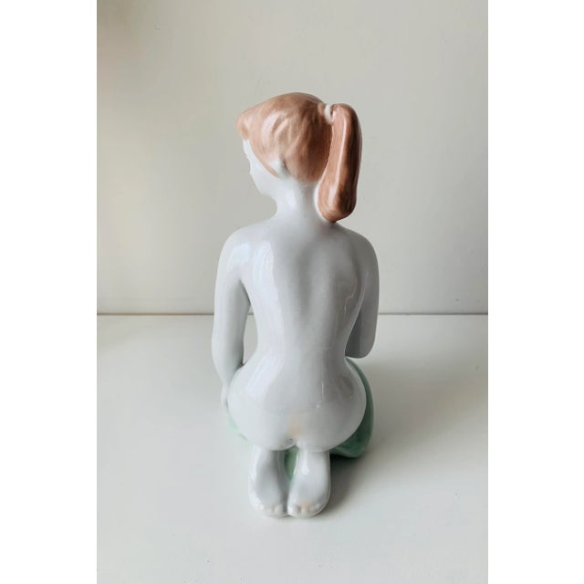 Delicate and elegant 1960’s porcelain woman’s figure from Hollohazi Porcelain. Hollohazi porcelain is one of the oldest...