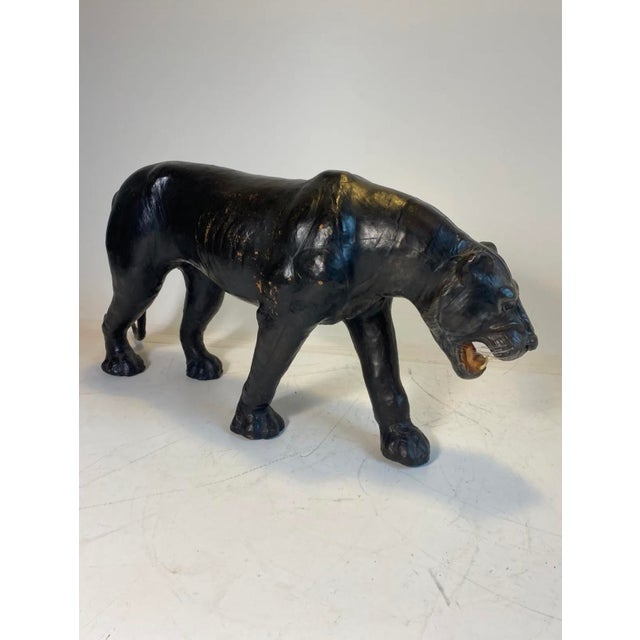 Xxl black leather panther by "liberty of london" from the 1970s beautiful and guaranteed rare in this size. dimensions: l...