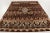 Hand-knotted in wool, this 8x10 vintage French rug, circa 1950–1959, features rhythmic geometric bands enriched with human...