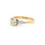A striking diamond engagement ring crafted in 18ct yellow and white gold, featuring a substantial round brilliant cut...