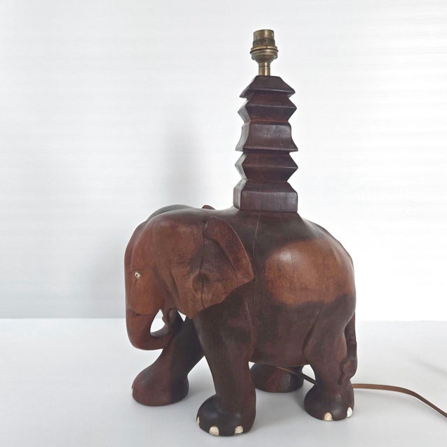Good overall condition, normal wood grain (cracks), possibly solid walnut. No tusks. Height 45 cm. Length 27 cm. Width 17...