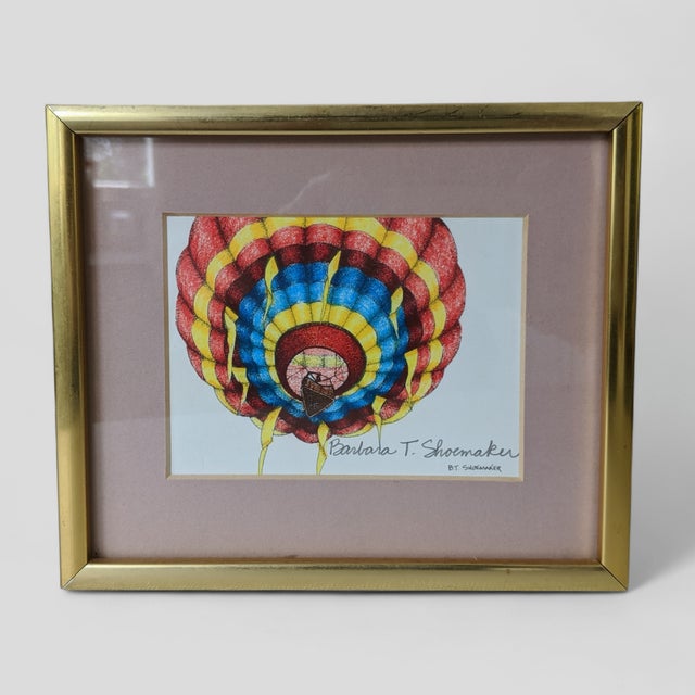 An Original Hot Air Balloon Lithograph Framed and Matted Pencil Signed by the Artist Encased in a Brass Frame encased...