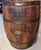 An early American treasure. This 19th century oak barrel has been repurposed as a table. Has a heavy, smoked glass top...