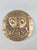 A double-sided gilt bronze medal entitled "Homage to César," created by the artist and engraver Roger Bezombes (1913-1994)...
