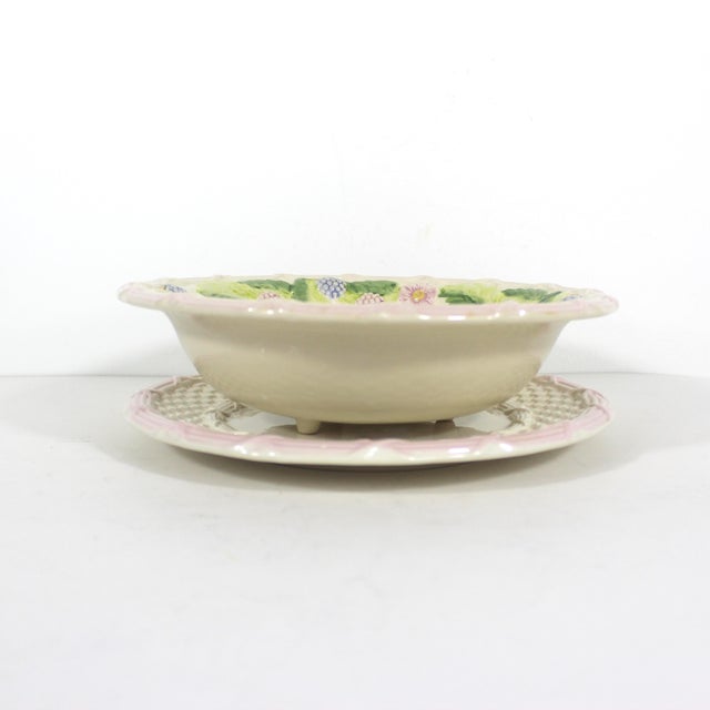 Absolutely beautiful French majolica colander or berry bowl with a draining plate. The colours are pale creamy white base...