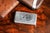 A distinguished example of English craftsmanship, this antique sterling silver table snuff box captures the refinement and...