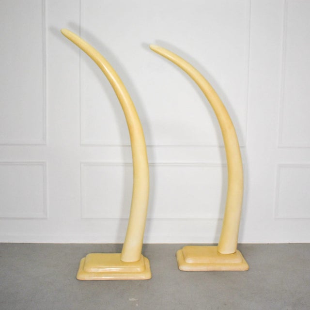 Monumental life size faux elephant tusks. Circa 1970's. Iconic Pieces. Nice vintage condition with original finish showing...