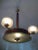 - French Art Deco pendant from the 1940s - Made of walnut wood, matte glass, and brass - Two central interior bulbs and...