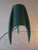 Tripod table lamp Arcadia made of plastic in turquoise green with transparent stripes through which the light shines....