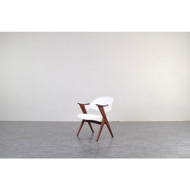 This armchair model Blinken was designed in the 1950s by the Norwegian designer Sigurd Resell for Rastad & Relling. The...