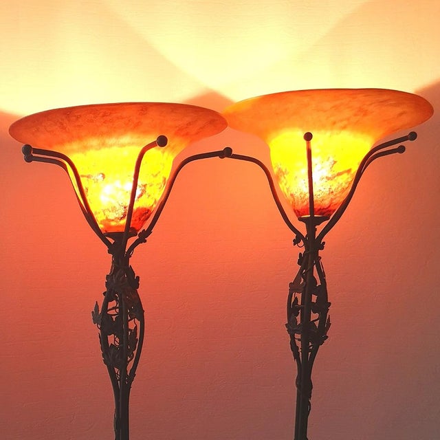 Made in France 1995. Pair of matched, handmade, unique floor lamps in the style of Art Nouveau. Wrought iron stand with...