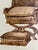 Rare nineteenth-century chromolithograph depicting an elaborate Renaissance Revival curule chair with matching floor...