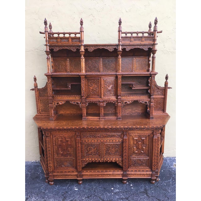 Monumental antique hand carved elmwood cabinet. Sideboard, 20th century.