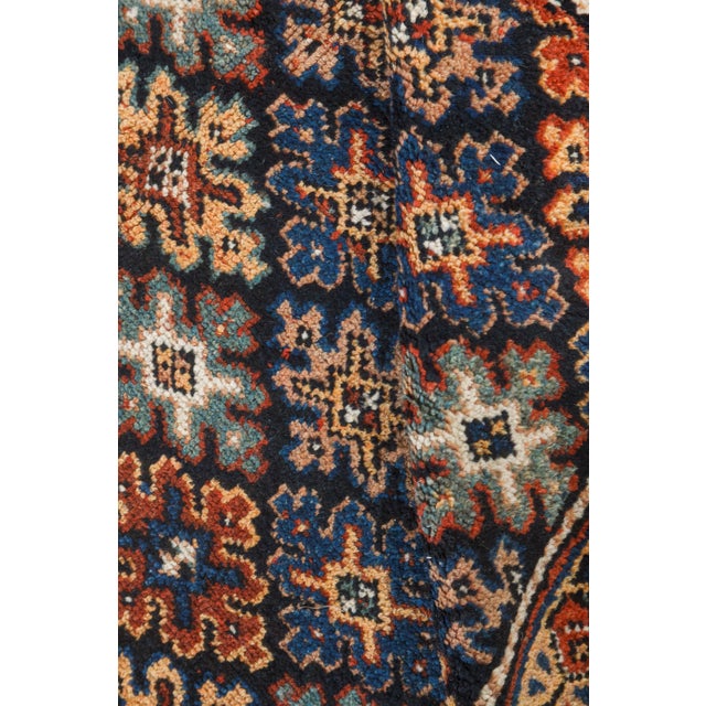 A vivid celebration of Caucasian craftsmanship, this antique Karabagh runner from the 1920s embodies the bold spirit and...