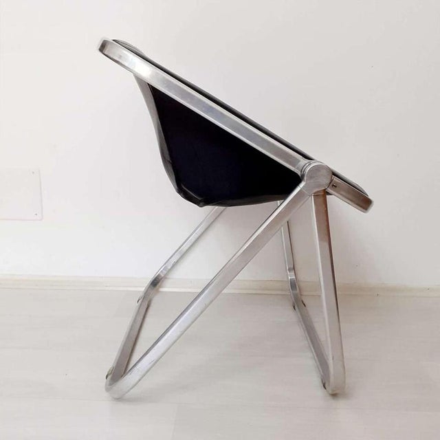 Italian armchair plona; design giancarlo piretti for anonima castelli; 1970. Folding armchair with chromed aluminum...