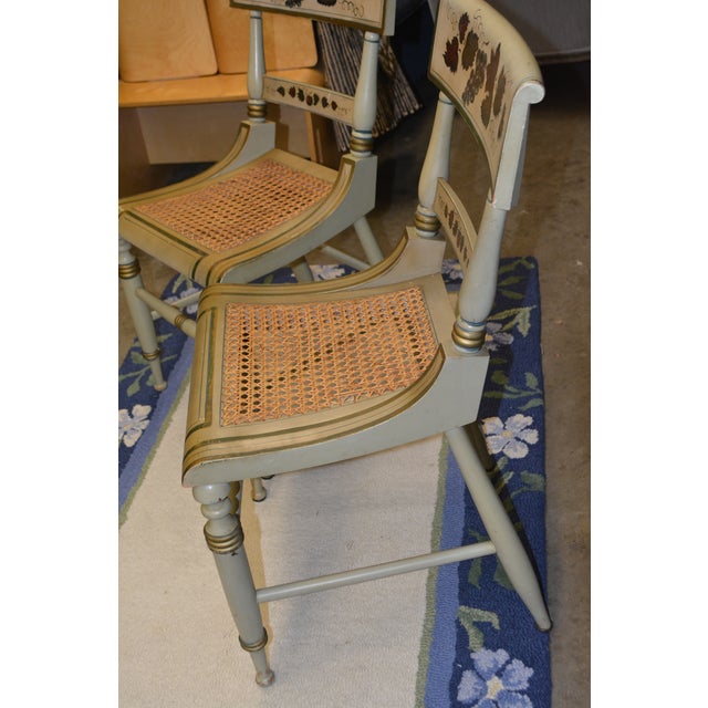 Wood Vintage Pair Green Hitchcock Style Painted / Stenciled Dining or Side Chairs With Cane Seats For Sale - Image 7 of 18