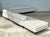 This vintage custom geometric sectional sofa is a striking embodiment of mid-century modern design, blending bold visual...