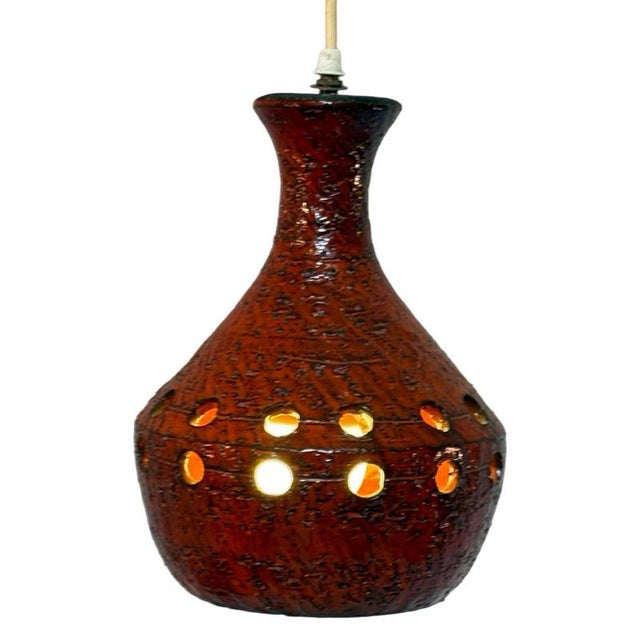 Vintage ceiling mounted / hanging fixture. Made in Germany and a prime example of fat lava lighting. Will look amazing in...