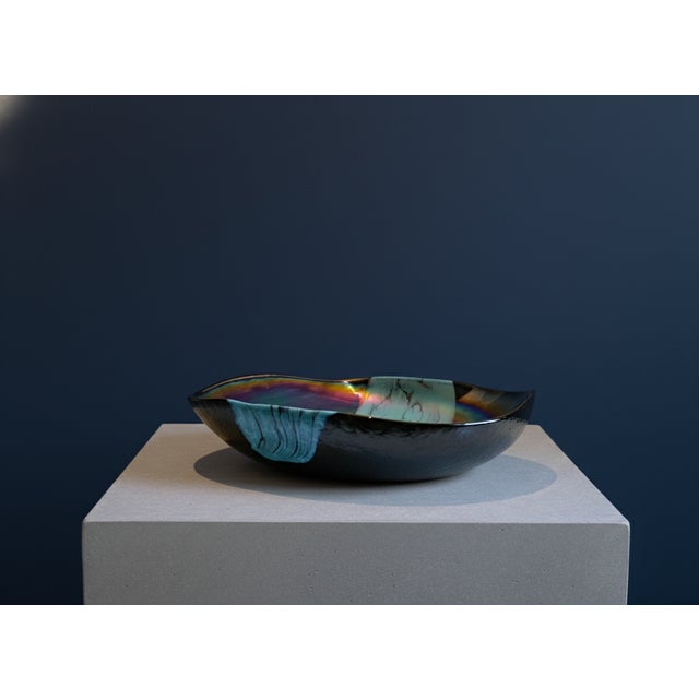 The Yalos Murano centerpiece features a square shape with slightly rounded corners, giving it a contemporary look. The...