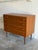 This sleek piece features four spacious drawers set above tapered legs. Smooth horizontal carved pulls highlight the clean...
