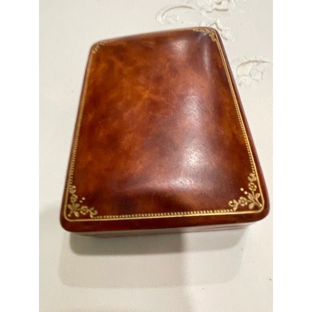 Beautiful gold embossed fine leather Italian box purchased in Florence, Italy in 1959. Can be used for playing cards,...