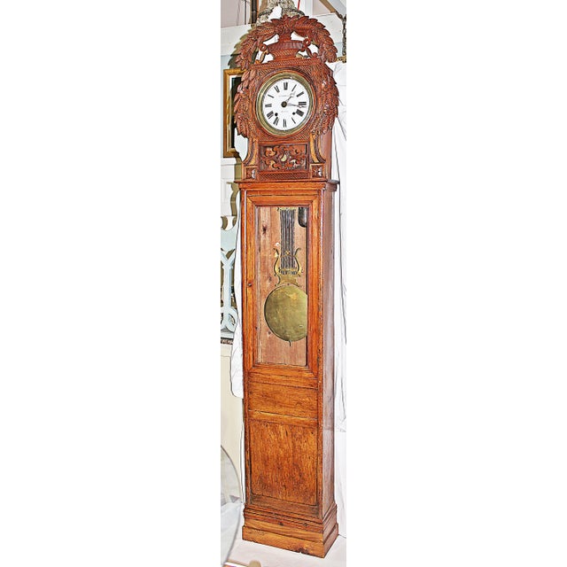 18-19th century Morbier St. Nicholas tall clock from Luneray in Normandie. Unusual original glass door and full-length...