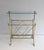 This very beautiful and elegant neoclassical style magazine rack is made of brass with a glass top. It is a French work by...