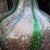 This Pair of mid-century Italian Murano art glass table lamps with shimmering gold-toned aventurine-style inclusions has a...