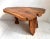This Mid Century Acadia wood coffee table was made in South East Asia around the 1950's or 1960's. Handcarved from a...