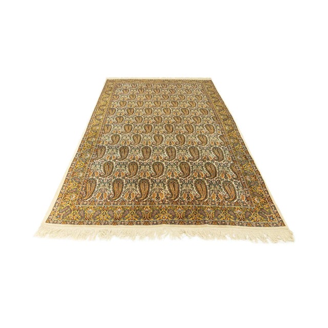 Rug from the holy city of Qom. The new wool used, the so-called cork wool is shorn at the neck of the Lamb. It makes it...