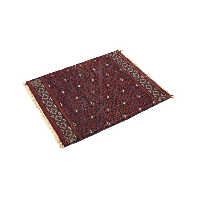 Hand woven in Turkey originating between 1950-1960, this vintage mid-century kilim rug enjoys a Soumak style weave thicker...
