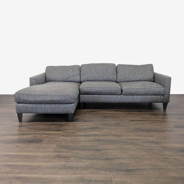 Features track arms, tapered wood legs and chaise. Brand: Room and Board. Original Price: $3200. Dimensions (in): 105W x...