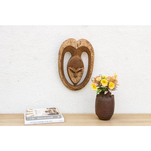 This charming Kwele mask from Gabon or the Republic of Congo is a delightful example of African tribal art. The mask is...