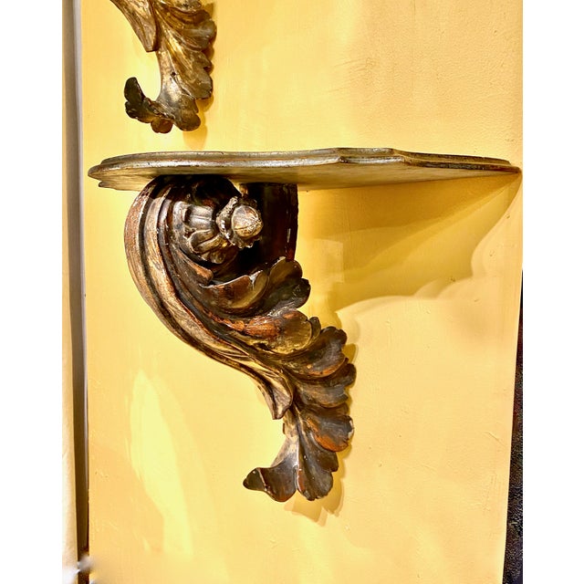 This is an exceptional pair of large Italian carved gold leafed acanthus leaf-form brackets. The generous size of the...