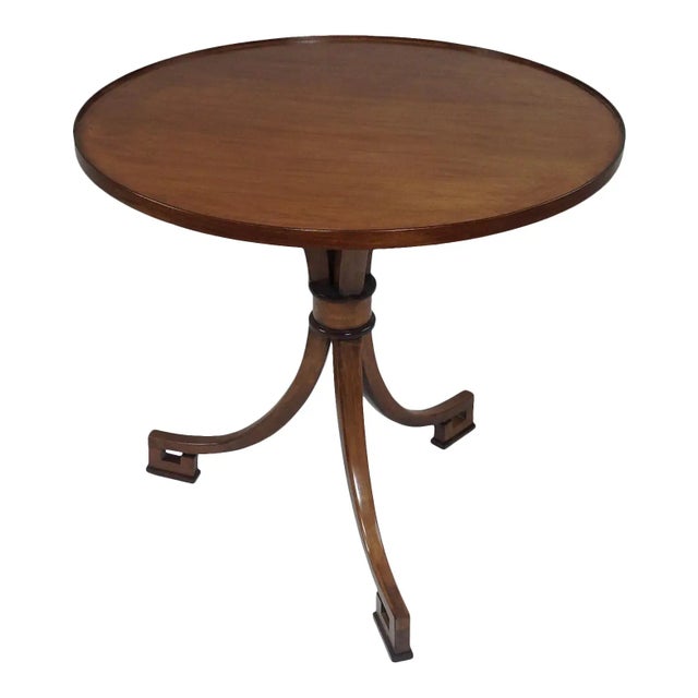 Modern Klismos style Greek key end table. The table is in flawless condition and ready to enjoy. The table has a modern...