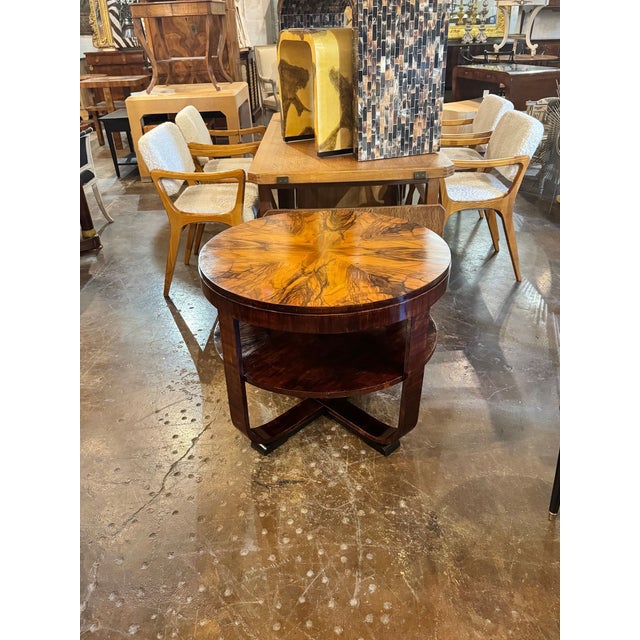 This Italian Mid-century Art Deco Style Walnut Table is a timeless and elegant piece of furniture perfect for any indoor...