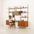 This elegant danish mid-century teak wall unit, designed by preben sorensen and manufactured by ps system in randers in...