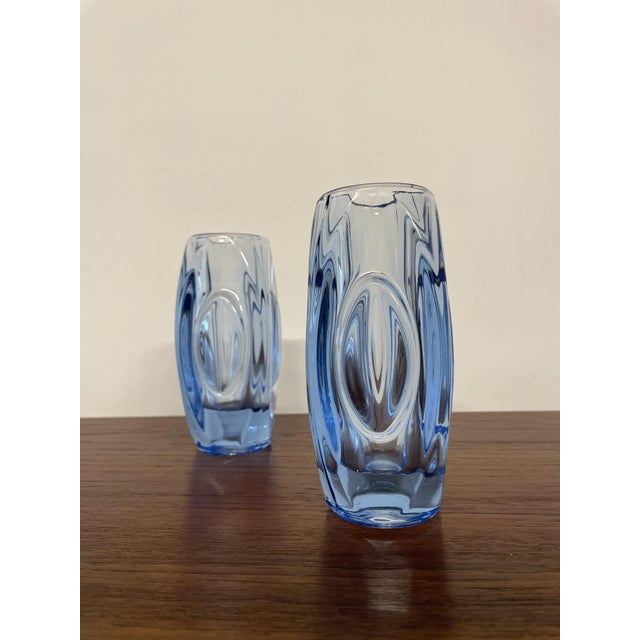 This elegant set of two mid-century glass vases was designed by Rudolf Schrötter for Rosice Glassworks in Czechoslovakia...