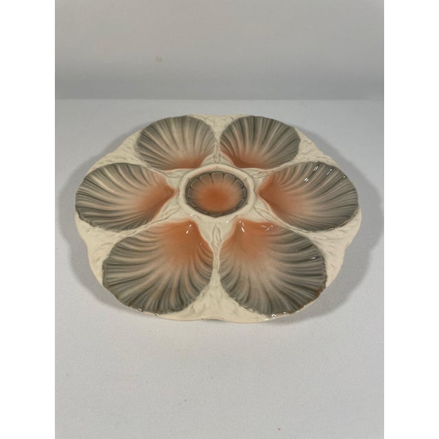 A stunning hand crafted ceramic Majolica Sarreguemines Oyster Plate made in northern France. Circa 1920s. Maker's marks...